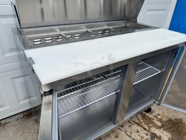 AVANTCO 2 Door Sandwich Table, Model 178SCL2, on casters, stainless steel, 115V, tested and working.