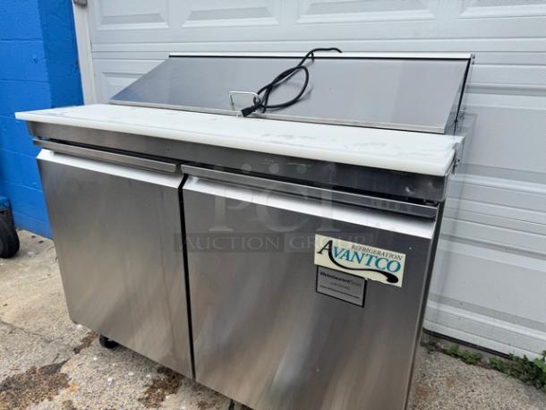 AVANTCO 2 Door Sandwich Table model 178SCL2 on casters, 115V. Stainless steel, tested and working. Visible branding on front.