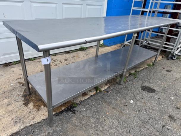 8Ft stainless steel work table with undershelf, durable condition, ideal for commercial kitchens.