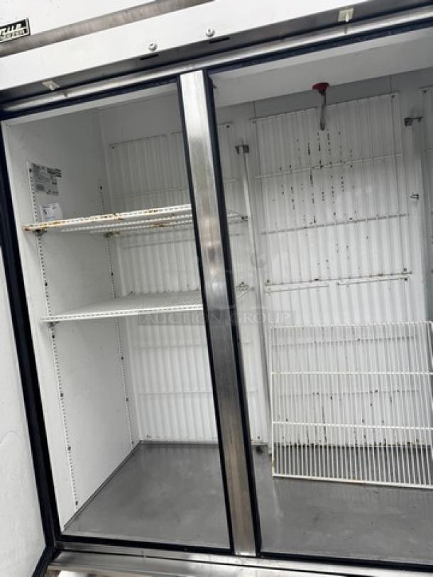 TRUE 3 Solid Door Freezer, Model T-72F, 115V. Features shelving, visible label inside, tested and working condition.