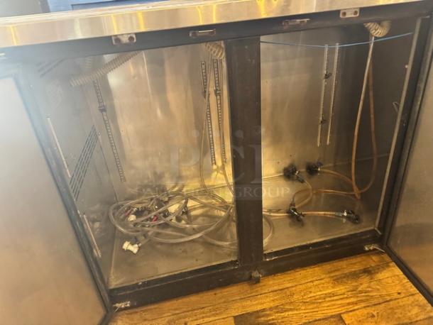 AVANTCO 3 Door Double Tap Kegerator, Model 178UDO72HC, in black. Tested & working, features beer dispenser hoses inside.