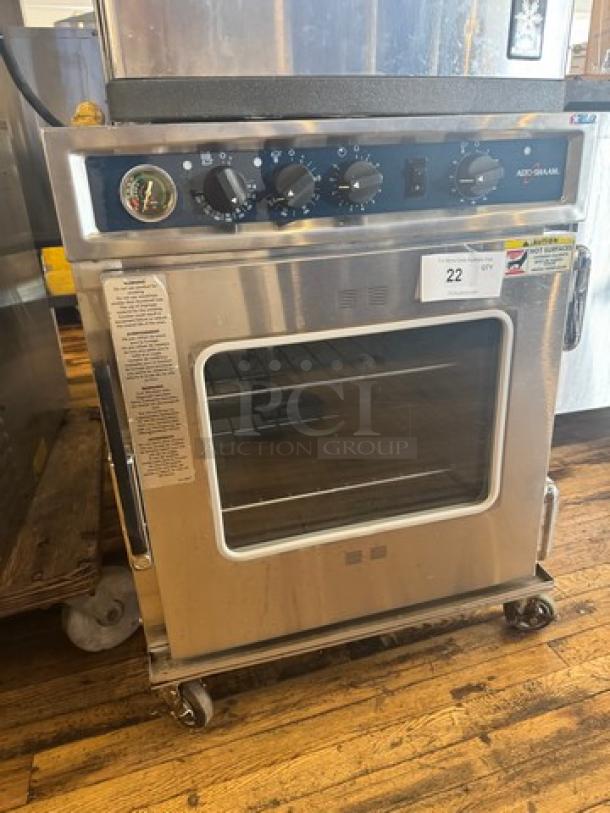 Alto-shaam 767-SK undercounter cook and hold smoker oven, 125V, stainless steel, visible dials, and clear door. Tested and working.