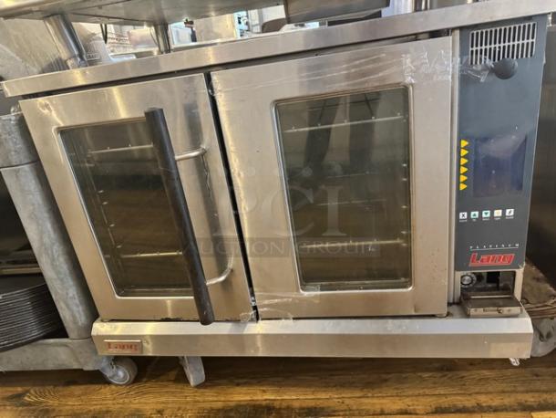 Lang Platinum electric full-size single deck convection oven. Tested and working. Stainless steel exterior, dual glass doors.