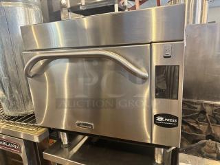 Amana Xpress AXP22T countertop convection oven, stainless steel, 208/240V, with front handle and display, in used condition.