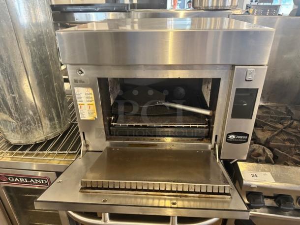 Amana Xpress Countertop Convection Oven, model AXP22T, 208/240V, stainless steel, used, with digital display and vent door open.