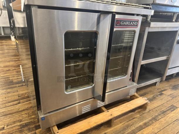Garland Master 300 natural gas convection oven, stainless steel, full-size, single deck, excellent condition, glass doors.