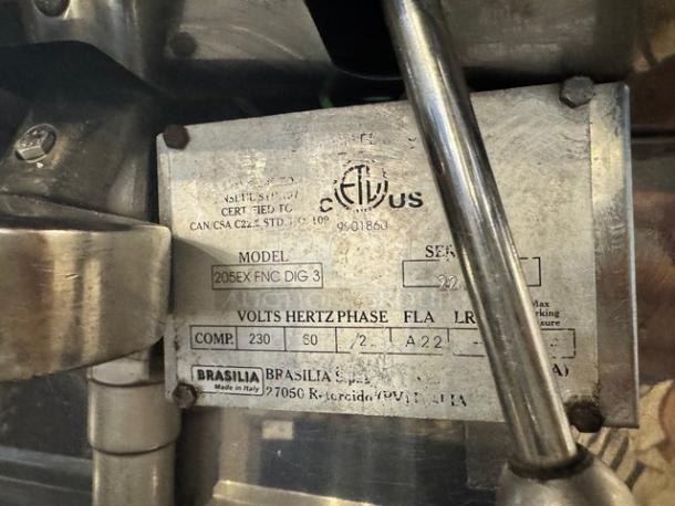 Brasilia Commercial Espresso Machine, Model 205EX FNG DIG3, shown with label detailing 230V power input and specifications.