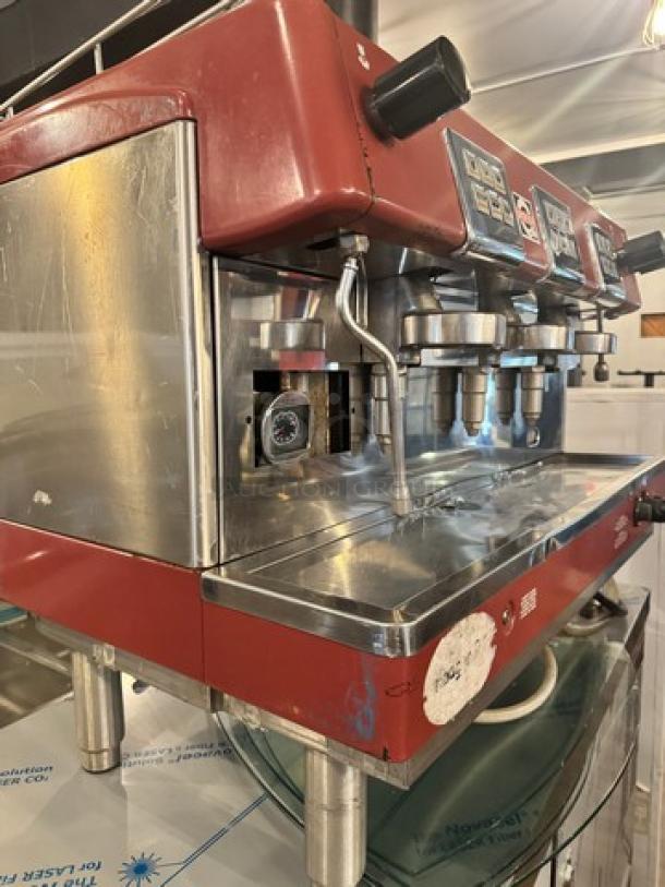 Brasilia Commercial Espresso Machine 205EX FNG DIG3, 230V, in good condition, features multiple group heads and a stainless steel finish.