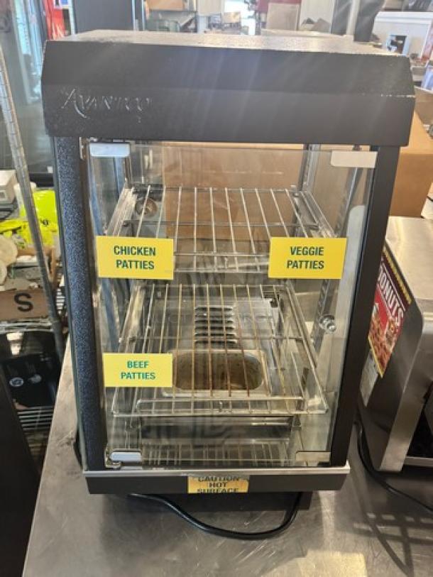 AVANTCO 13" countertop heated display warmer, model SW-4H, features multiple shelves and labels for patties. Tested and working condition.