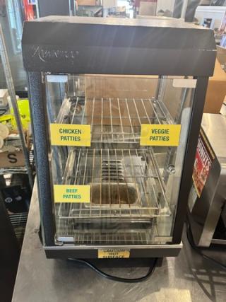 AVANTCO 13" countertop heated display warmer, model SW-4H, features multiple shelves and labels for patties. Tested and working condition.