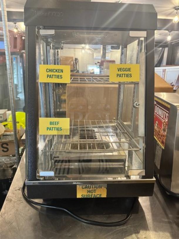 AVANTCO 13" countertop heated display warmer, model SW-4H, with shelves labeled for patties, tested and working condition.