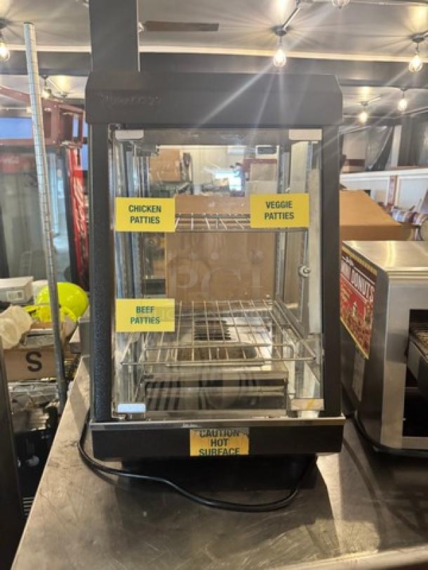 AVANTCO 13" countertop heated display warmer, model SW-4H, in working condition. Visible labels: "Chicken Patties," "Veggie Patties," "Beef Patties."