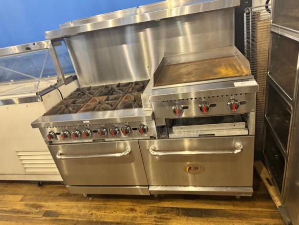 CPG natural gas stove with 6 burners and 24" griddle on legs. Stainless steel, sturdy build, red knobs, lightly worn.