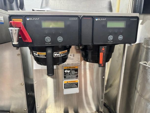 BUNN AXIOM Dual Coffee Brewer, 120V, black, stainless steel, digital controls, warning labels, dual hot water dispensers.