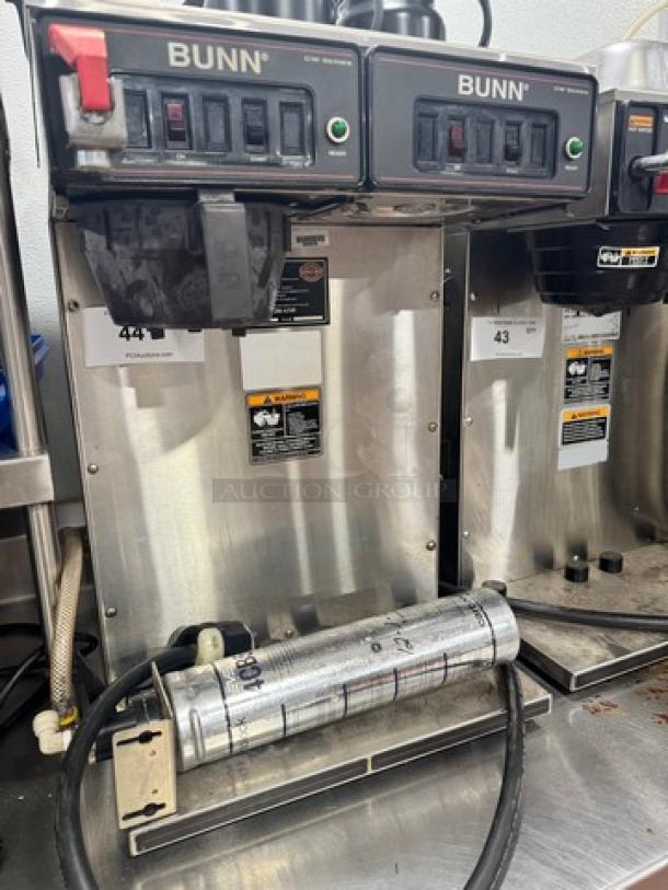 BUNN CW Series Dual Coffee Brewer, 120V, stainless steel, two brew heads, controls visible, good condition.