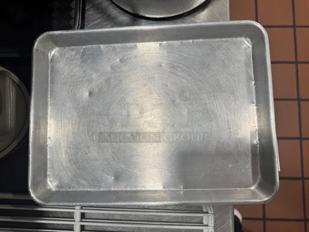 Lot of 9 aluminum pans, 13x9.5 inches, used condition, minor scratches and dents, sold together.