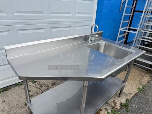 Stainless steel 60" sink and table with a broken faucet, two-tier design, used condition, ideal for commercial kitchens.