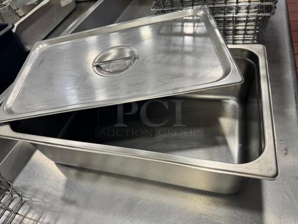 Stainless steel food pan with lid, 21x13", full size, excellent condition, smooth finish.