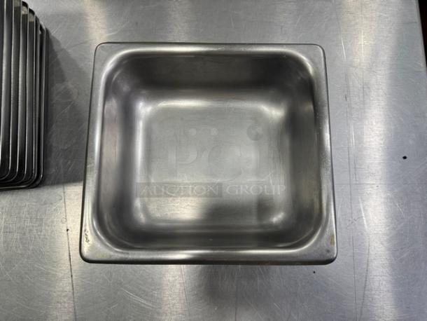 7" stainless steel food pan BIDX12, excellent condition, smooth surface, ideal for commercial kitchen use.