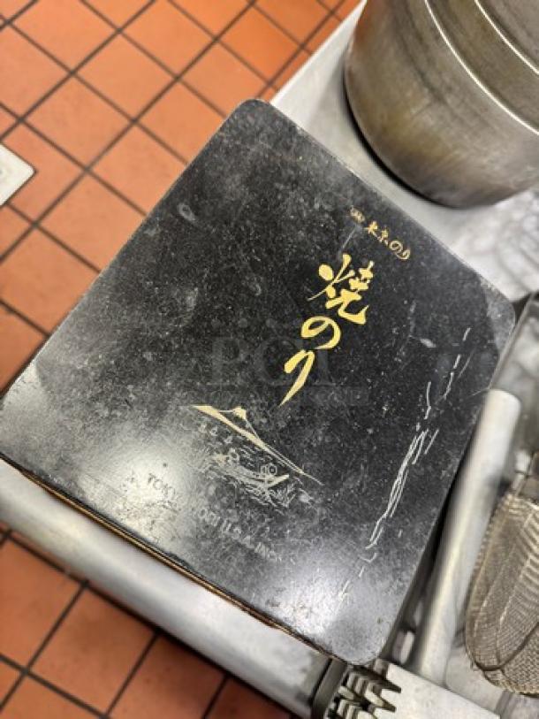 Lot of 4 aluminum storage boxes, each with Japanese markings, featuring signs of wear.