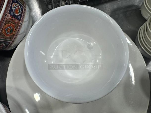 Tai-Hong melamine ware plastic bowl, white, circular, durable finish, minimal scuffs, item code BIDX5, excellent condition.