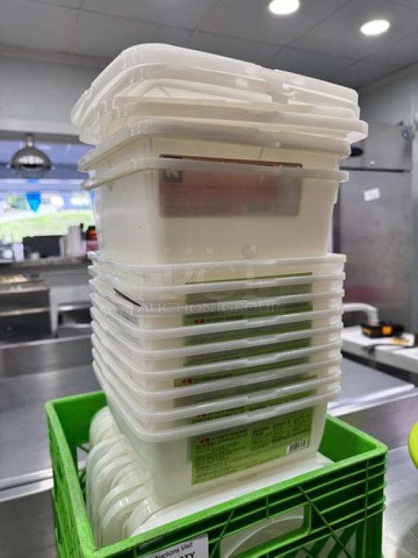 Stack of plastic food pans with lids, good condition.