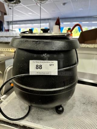 Commercial 10 Quart Electric Soup Kettle, black, with visible power cord and label. Used condition, ideal for catering.