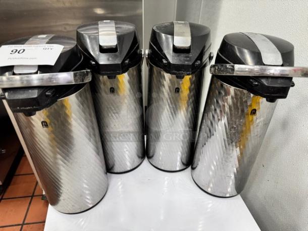 Newco Thermal Airpots BIDX4 set, stainless steel, excellent condition, thermal insulation, black lids, auction tag visible.