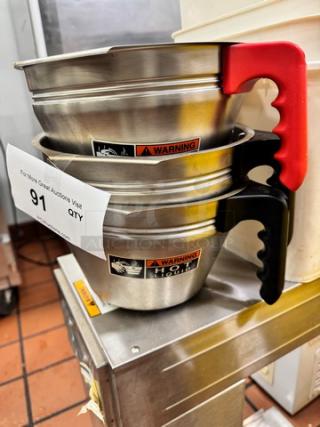Lot of 3 metal funnels with red and black handles, "Warning Hot" labels, stacked on stainless steel surface.