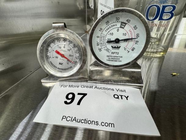 Lot of 2 refrigerator and freezer thermometers. NSF certified. Metal casing, dual scales in Fahrenheit and Celsius.