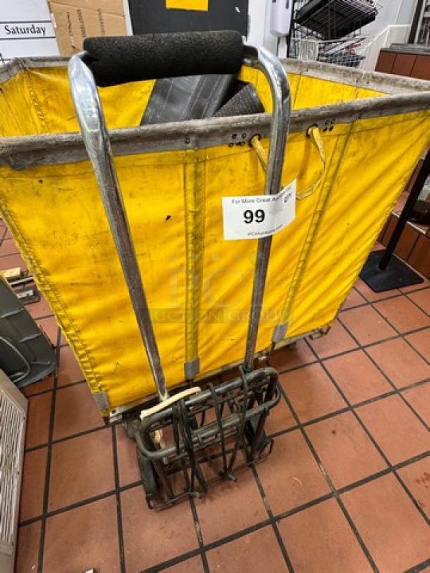 Rolling utility shopping cart with a yellow canvas bag and metal frame. Number 99 tag attached. Used condition.