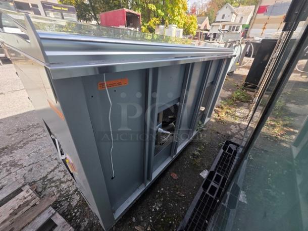 Duke SUB-CP-TC60M 60" Subway sandwich prep table cooler in outdoor setting. Needs new plug, visible wiring.