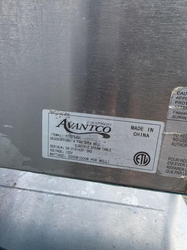 Avantco STE-4SA four pan electric steam table with undershelf, model label showing specifications, made in China.