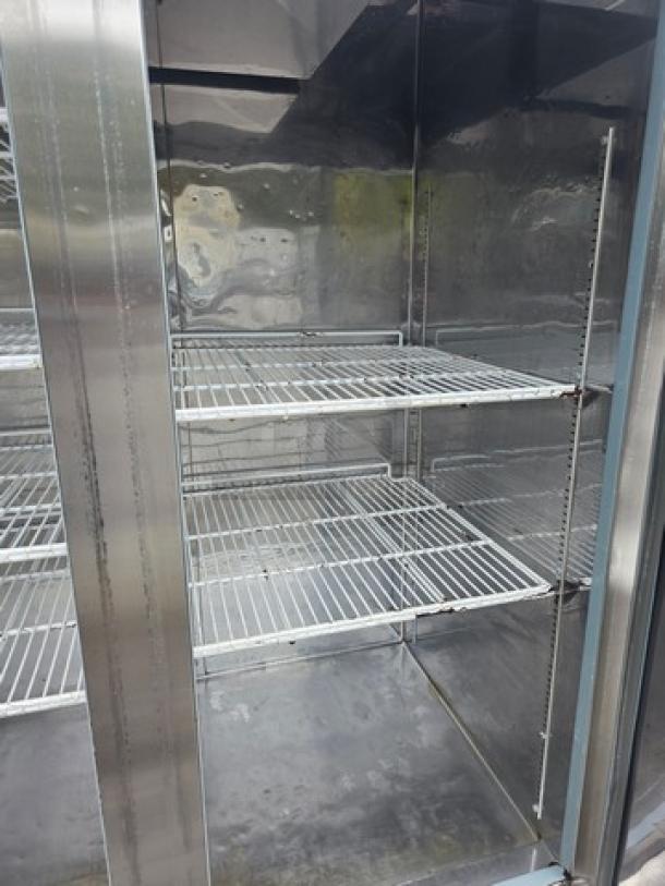 Serv-Ware RR2 Reach-In, 2 Door Commercial Stainless Steel Refrigerator on casters, interior shelves, excellent condition.