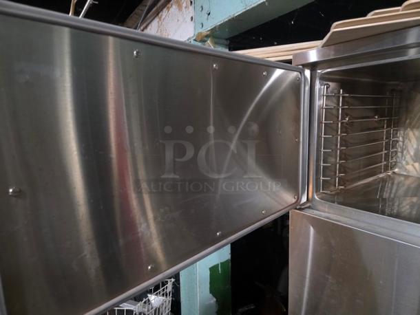 Vulcan-Hart VS3616GE Natural Gas Convection Steamer, stainless steel, shows inner chamber and door, excellent condition.