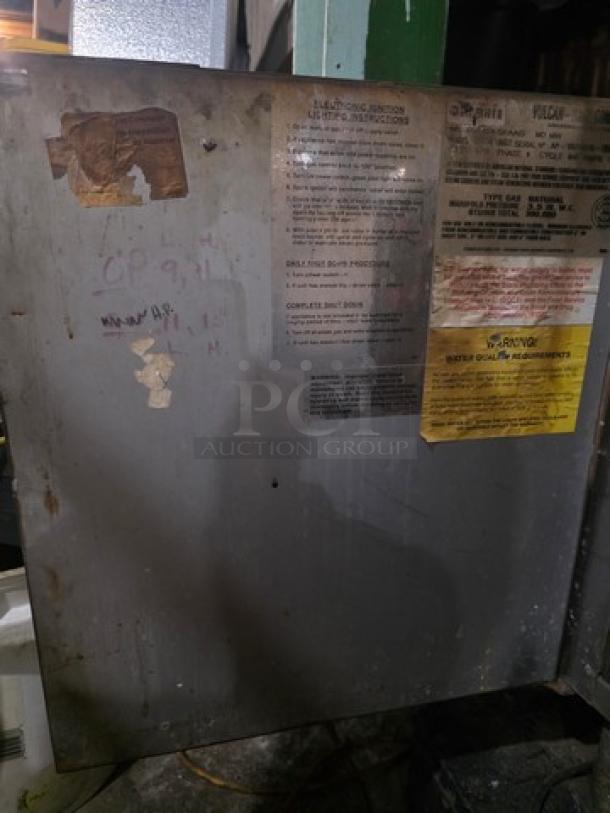 Vulcan-Hart VS3616GE Natural Gas Convection Steamer. Visible labels with instructions and safety warnings. Used condition.