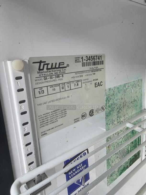 True QA-60-24M-B 60" refrigerated prep table label, model and design details visible. Appears in good condition.