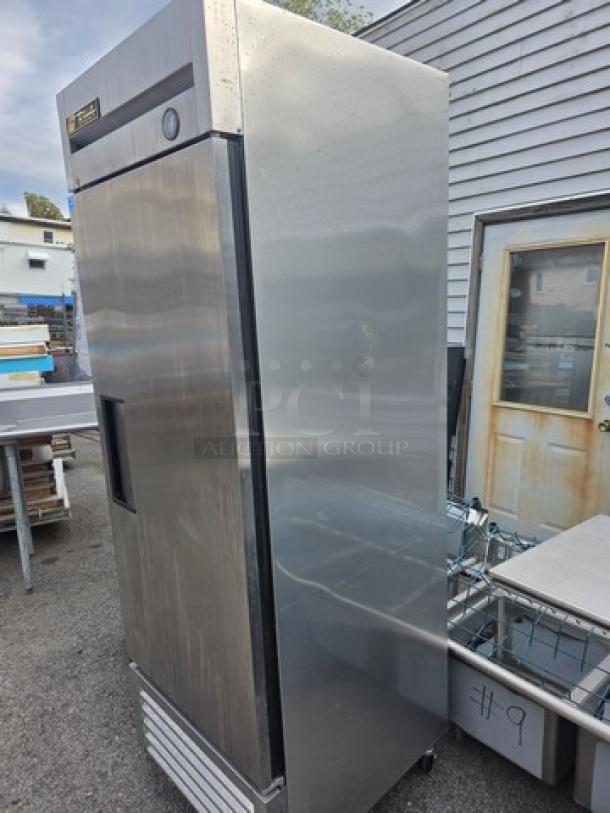 True T-23 Reach-in Refrigerator, solid swing door, stainless steel, on casters, used condition.
