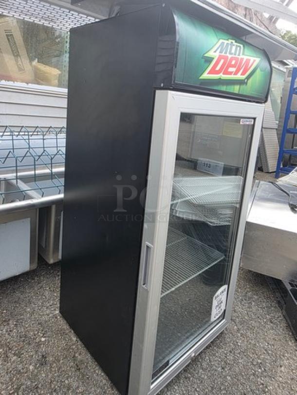 CTB120 Countertop Cooler with glass door, metal shelves, and "Mtn Dew" branding. Good condition.