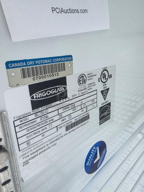 Frigoglass MC750-V2 single glass door refrigerator, barcode and model labels visible, on casters.