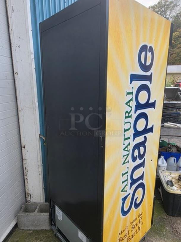 Frigoglass MC750-V2 single glass door refrigerator merchandiser, Snapple branding, on casters, used condition.