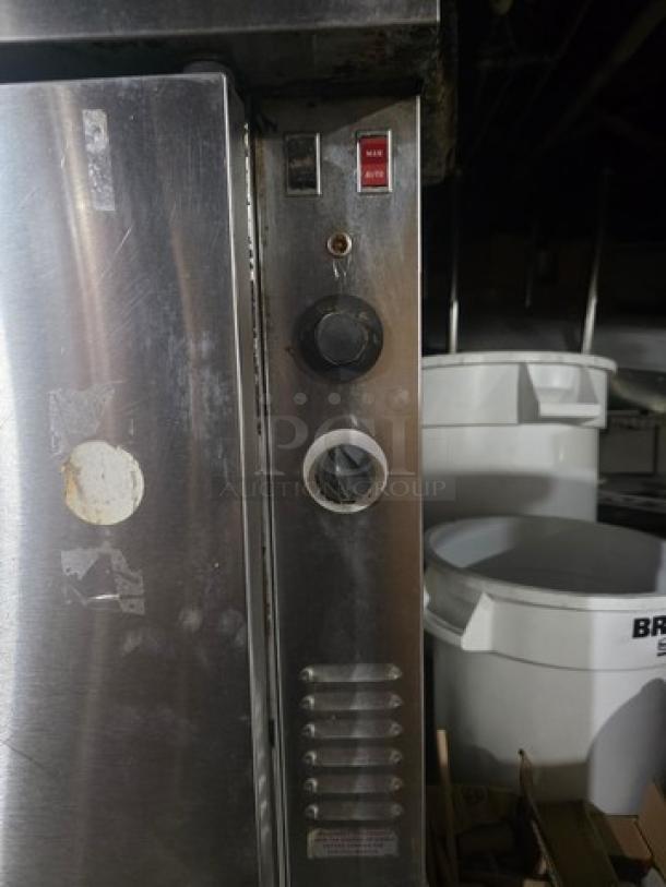 Blodgett SH1G-AA Double Stack Natural Gas Convection Ovens, stainless steel, worn controls, on casters, for auction.