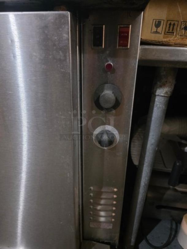Blodgett SH1G-AA double stack natural gas convection ovens, stainless steel, on casters. Control panel with switches visible.