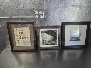 Lot of 3 framed pictures: one with calligraphy, one black-and-white architectural photo, one color landscape photo. Good condition.