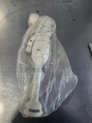 Braun Type 4166 Hand Held Blender, wrapped in plastic; white; model visible on body; appears unused.