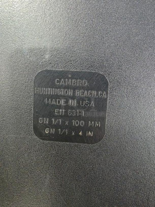 Lot of 3 Cambro plastic food pans, black. Markings: Cambro, Made in USA, EN 631-1, GN 1/1 x 100 mm, GN 1/1 x 4 in.
