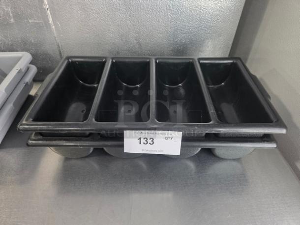 Lot of 2 black cutlery bins with four compartments each, in good condition. Label indicates "133 QTY 2XBID."