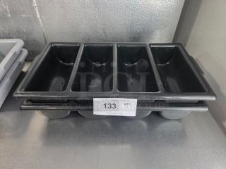 Lot of 2 black cutlery bins with four compartments each, in good condition. Label indicates "133 QTY 2XBID."