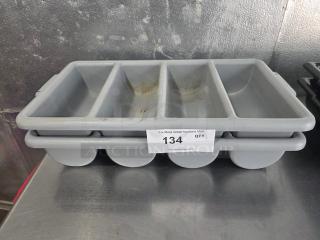 Lot of 2 gray plastic cutlery bins, each with four compartments. Visible wear and auction tag "134, QTY-2".