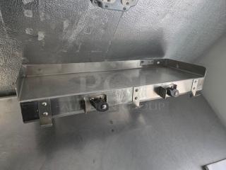 Stainless steel wall shelf by John Boos, in excellent condition, featuring sturdy brackets and a smooth finish.